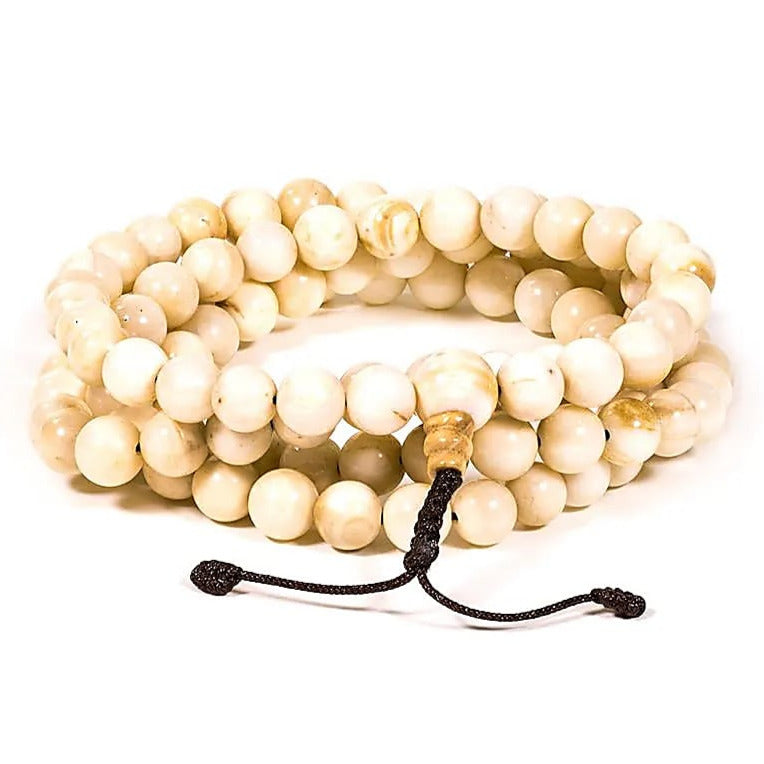 Shell mala, with 108 beads measuring approximately 0.8 millimeters. Approximately 85 centimeters long. AA to AAA quality, this stunning piece comes with a free storage pouch. Made in India!