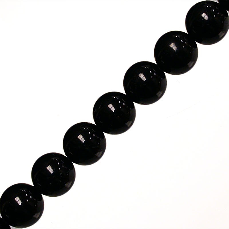 Tourmaline noire, perles rondes de 4, 6, 8 ou 10 mm. Vendu en fil de perle 38/39 cm, en bracelet de 17 à 21cm, en collier de 45 ou sautoir de 60cm. Qualité AA à AAA !