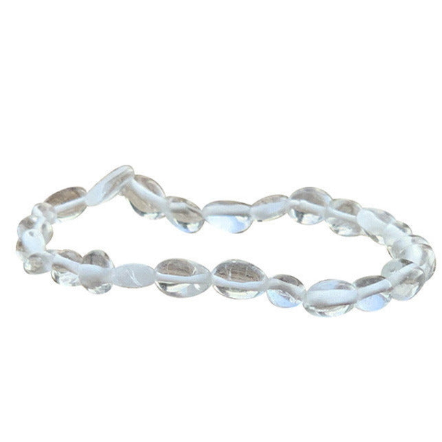 Cristal de roche (quartz), bracelet de 17 à 21cm, collier de 42cm et sautoir de 60cm. Perles de type 'Graine' de formes naturelles montées sur fil de haute résistance !