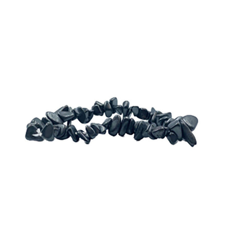Hématite, bracelet de 17 à 21 cm ou en collier de 42 cm ou sautoir de 85 cm. Perle de type 'baroque/ chips' de 4/7 mm, montées sur fil élastique ou fil d'acier de haute résistance !