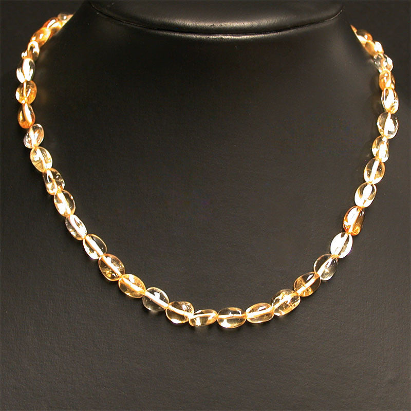Citrine (quartz), bracelet de 17 à 21cm, collier de 42cm et sautoir de 60cm. Perles de type 'Graine' de formes naturelles montées sur fil de haute résistance !