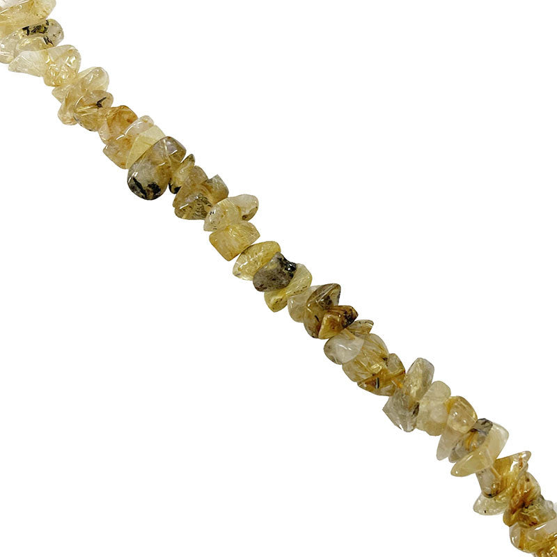 Cristal de roche (Quartz) a rutile doré, bracelet de 17 à 21cm, collier de 42cm et sautoir de 60cm. Perles de type 'Baroque' de formes naturelles montées sur fil de haute résistance !