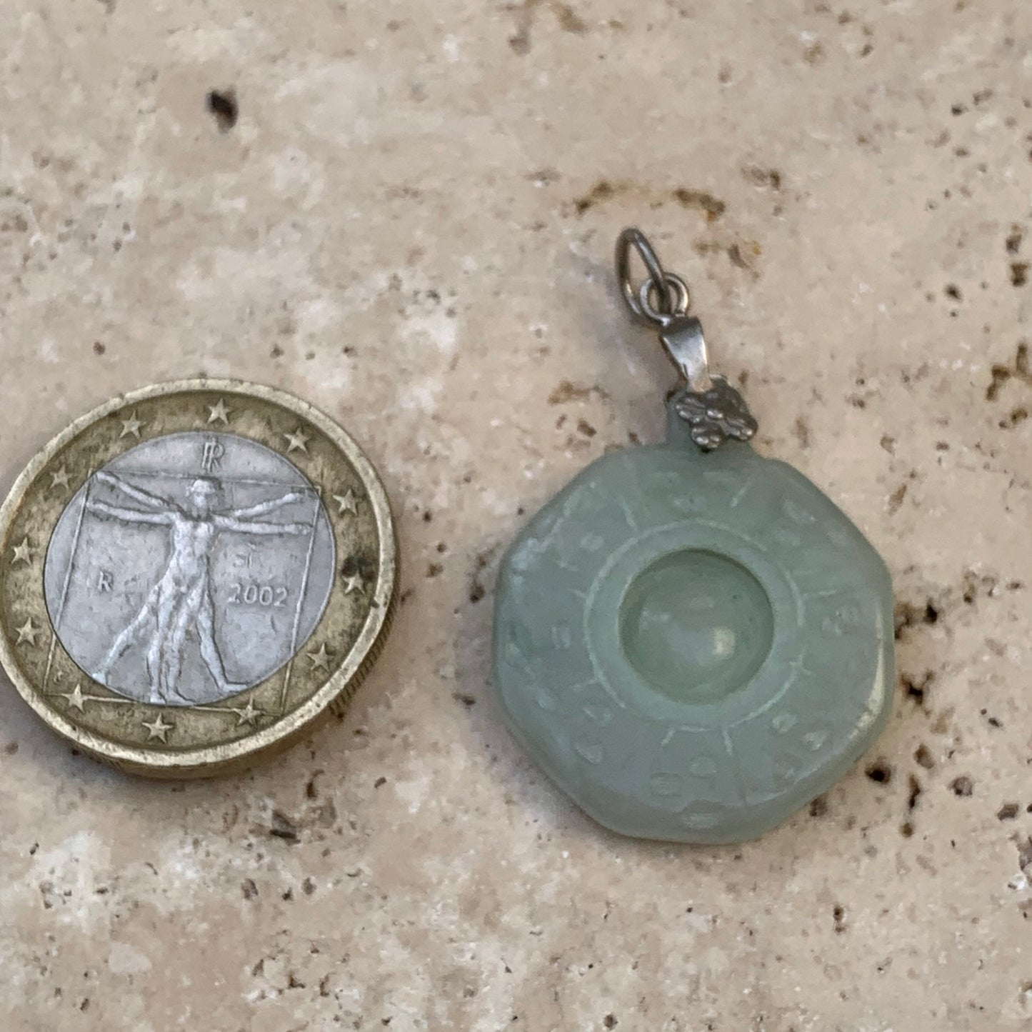 Jade! 'Wheel of Life' pendant with a pretty, fancy bail, 35 mm high x 23 mm wide x 5 mm thick. Sold with an adjustable black cord.