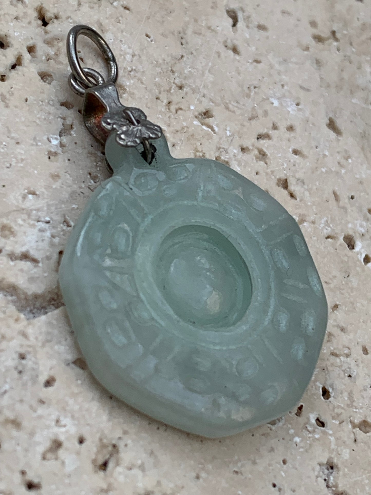 Jade! 'Wheel of Life' pendant with a pretty, fancy bail, 35 mm high x 23 mm wide x 5 mm thick. Sold with an adjustable black cord.