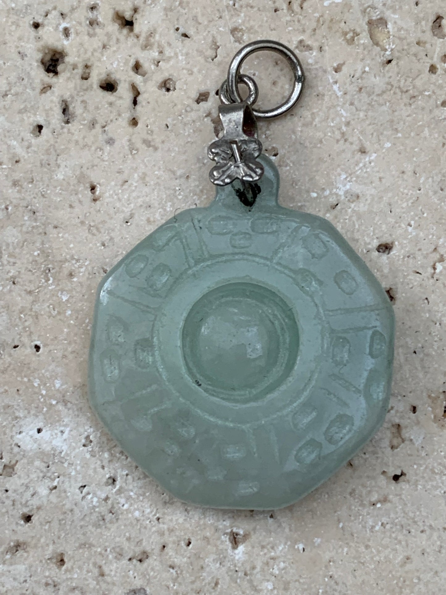 Jade! 'Wheel of Life' pendant with a pretty, fancy bail, 35 mm high x 23 mm wide x 5 mm thick. Sold with an adjustable black cord.