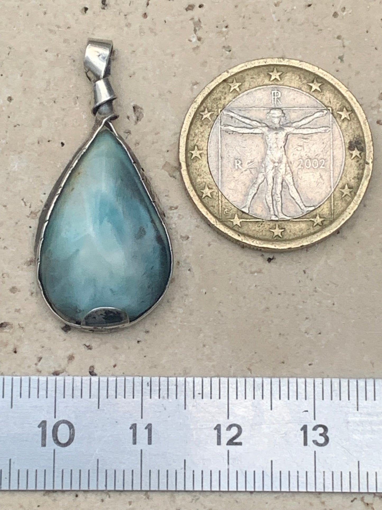 Larimar, Silver pendant, 35mm high x 16mm wide x 6mm thick. Sold with a free adjustable black cord!