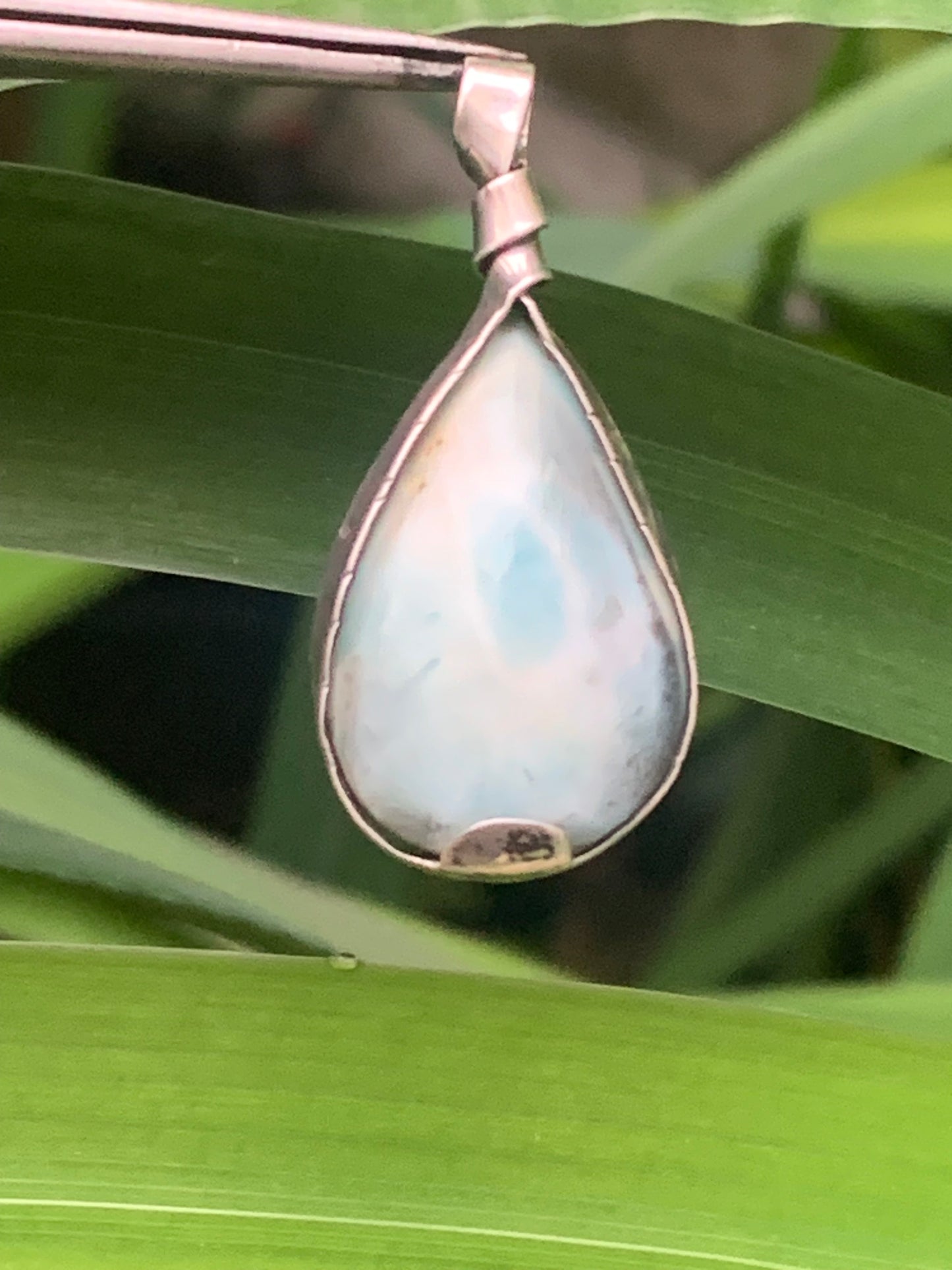 Larimar, Silver pendant, 35mm high x 16mm wide x 6mm thick. Sold with a free adjustable black cord!
