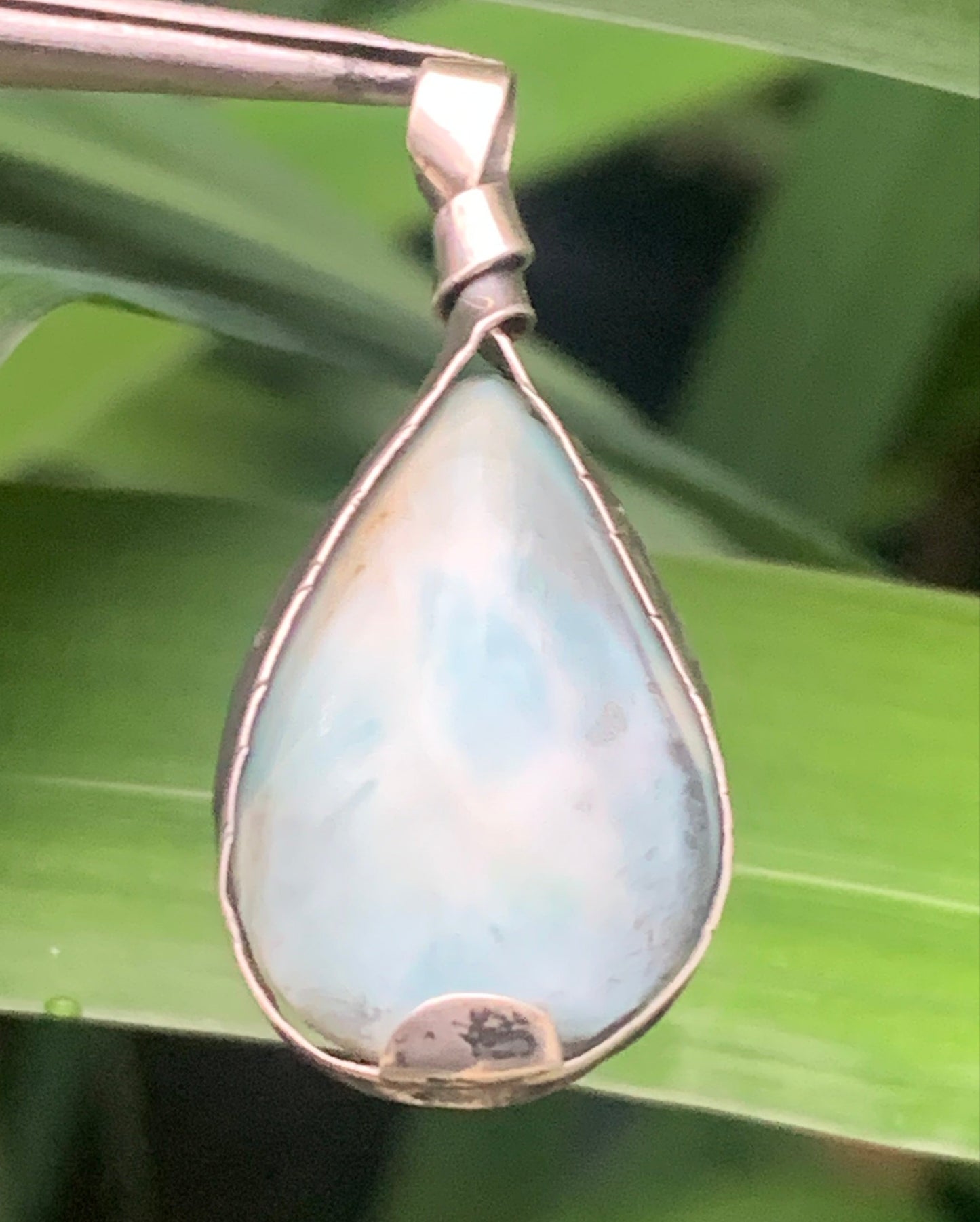 Larimar, Silver pendant, 35mm high x 16mm wide x 6mm thick. Sold with a free adjustable black cord!