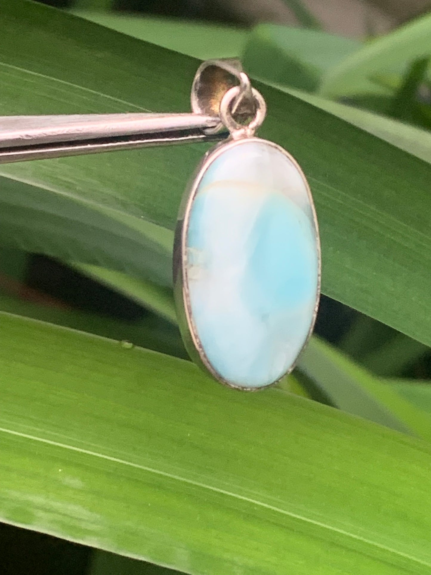Larimar, Silver pendant, 35mm high x 15mm wide x 7mm thick. Sold with a free adjustable black cord!