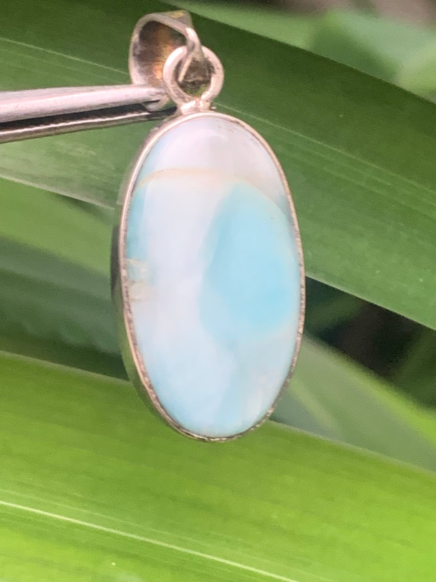 Larimar, Silver pendant, 35mm high x 15mm wide x 7mm thick. Sold with a free adjustable black cord!