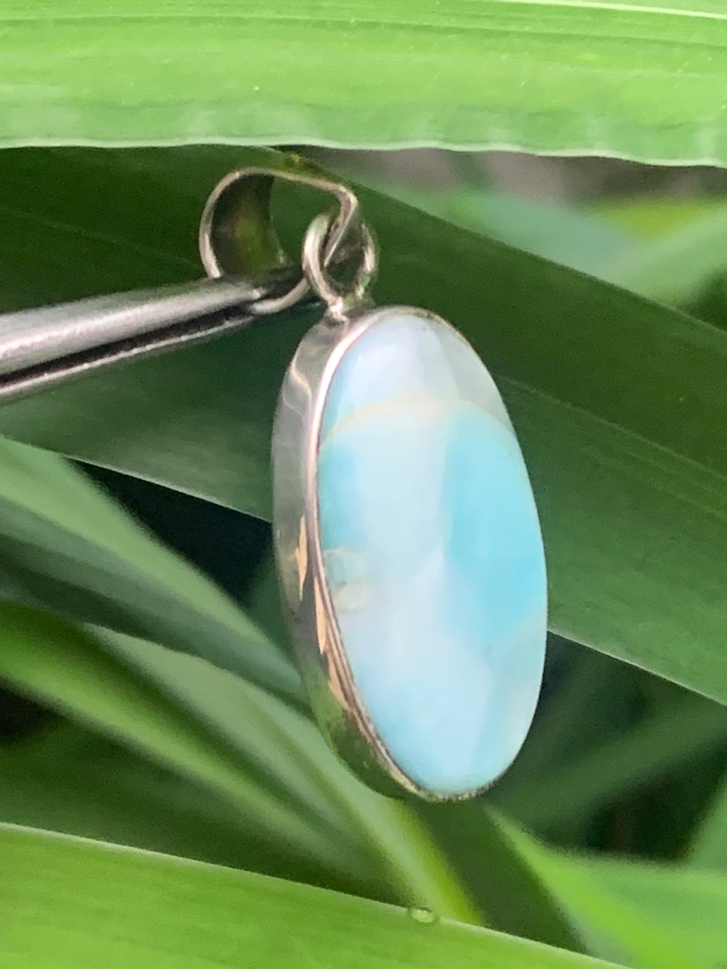 Larimar, Silver pendant, 35mm high x 15mm wide x 7mm thick. Sold with a free adjustable black cord!