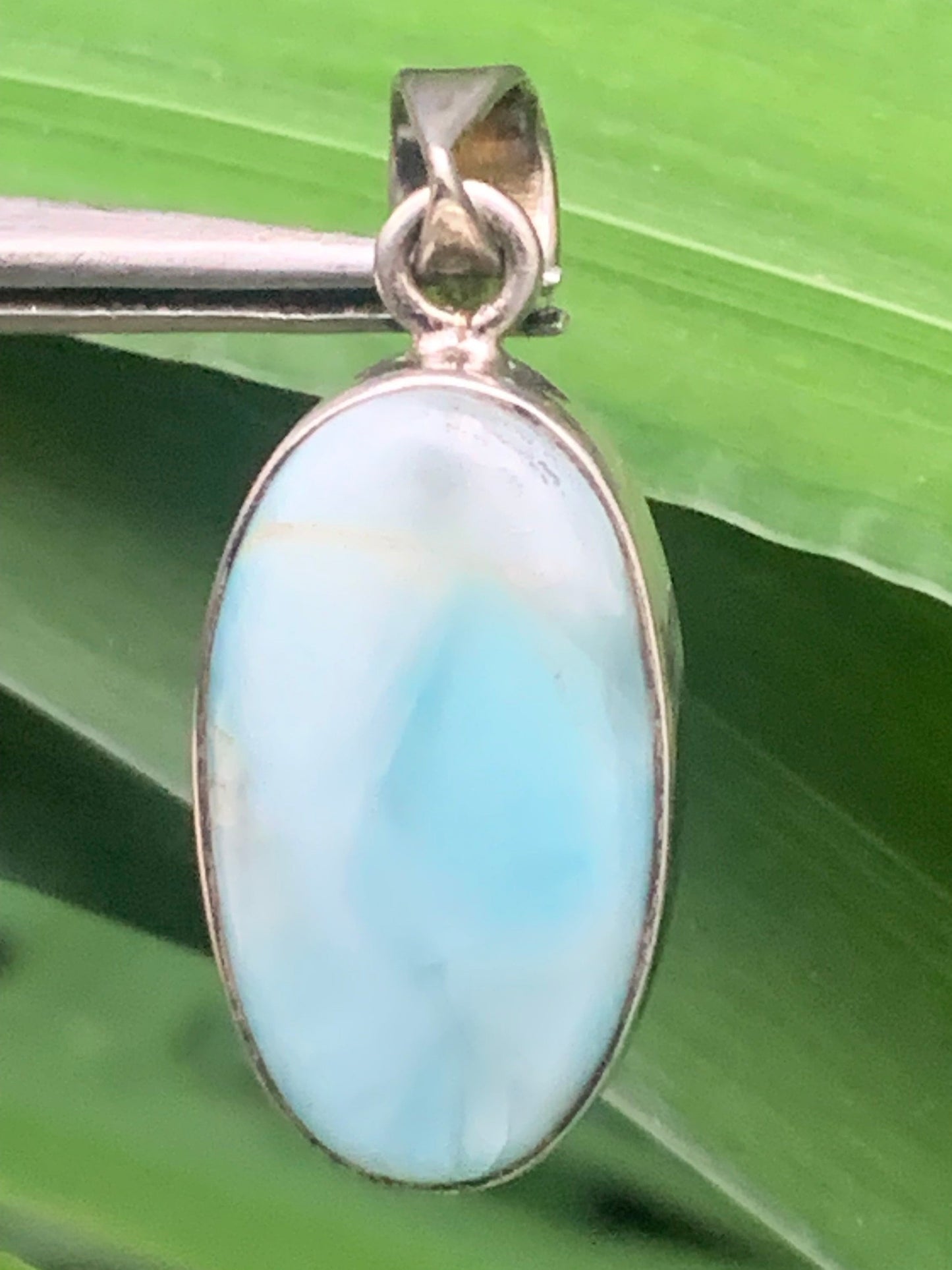 Larimar, Silver pendant, 35mm high x 15mm wide x 7mm thick. Sold with a free adjustable black cord!