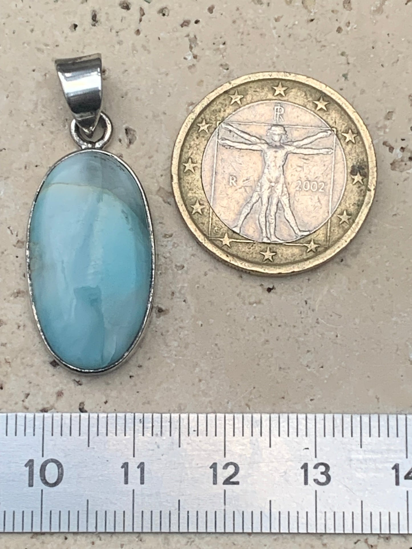 Larimar, Silver pendant, 35mm high x 15mm wide x 7mm thick. Sold with a free adjustable black cord!