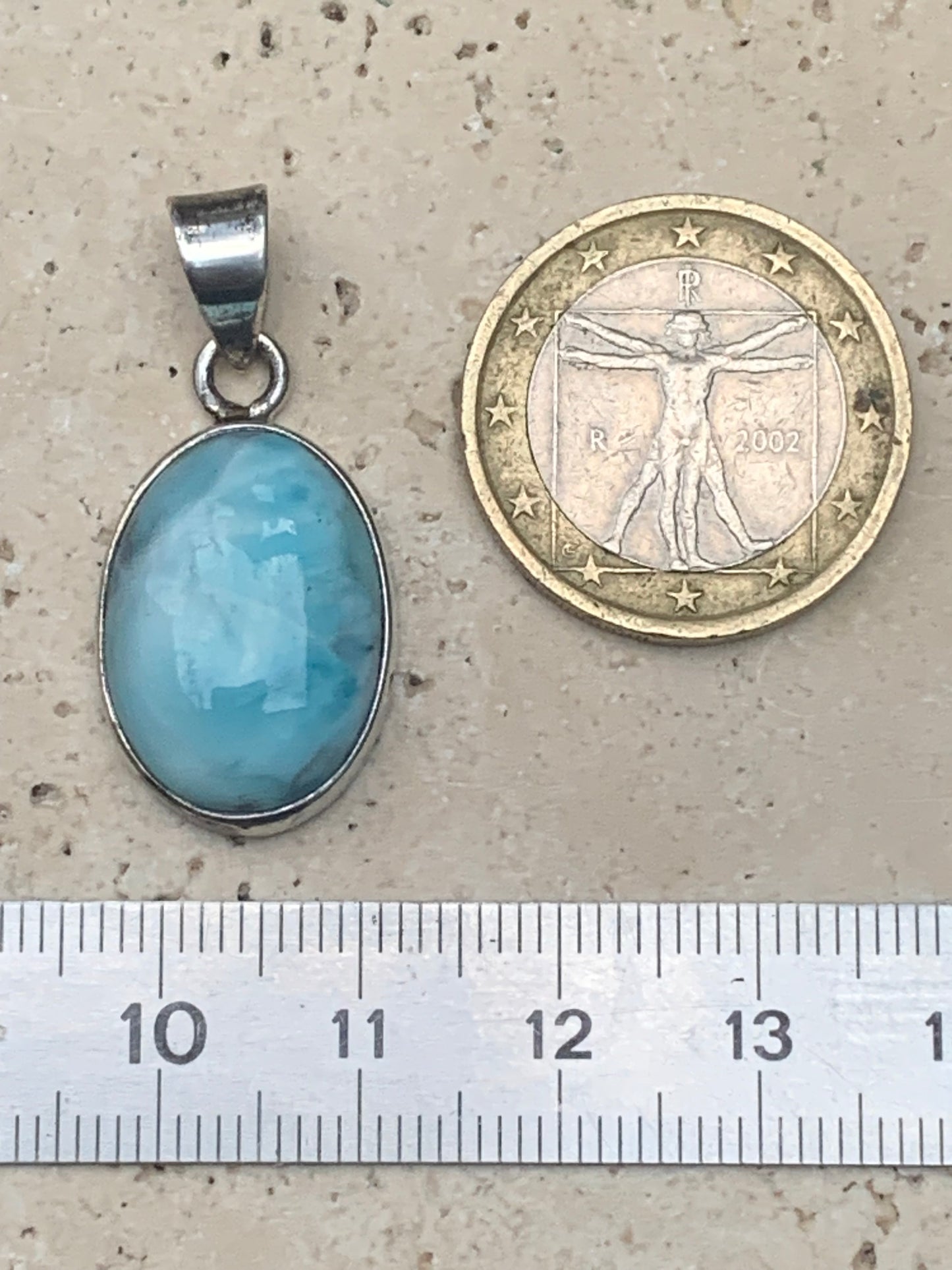 Larimar, Silver pendant, 31mm high x 15mm wide x 7mm thick. Sold with a free adjustable black cord!