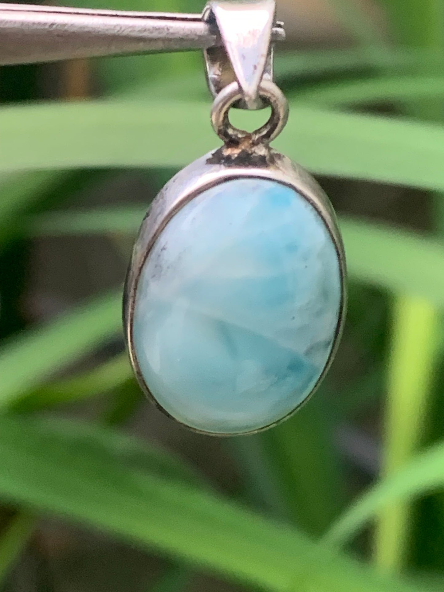 Larimar, Silver pendant, 31mm high x 15mm wide x 7mm thick. Sold with a free adjustable black cord!