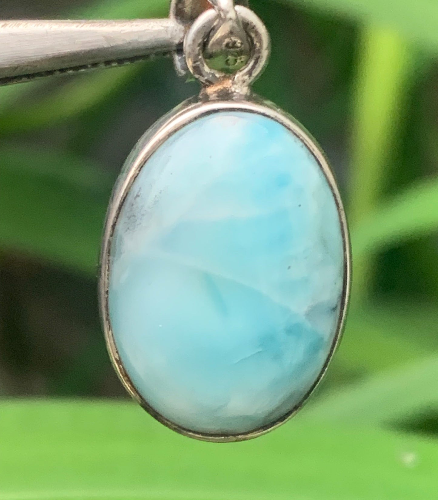 Larimar, Silver pendant, 31mm high x 15mm wide x 7mm thick. Sold with a free adjustable black cord!