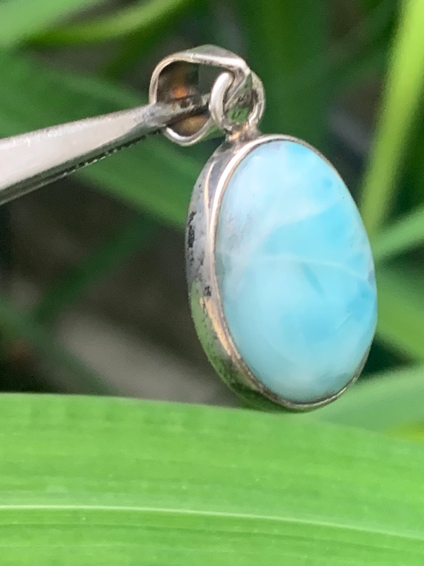 Larimar, Silver pendant, 31mm high x 15mm wide x 7mm thick. Sold with a free adjustable black cord!