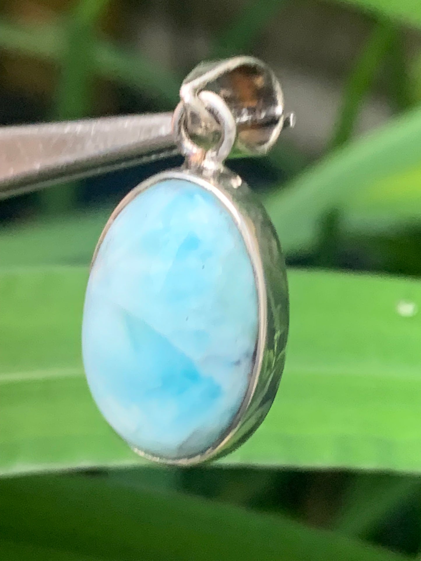 Larimar, Silver pendant, 31mm high x 15mm wide x 7mm thick. Sold with a free adjustable black cord!