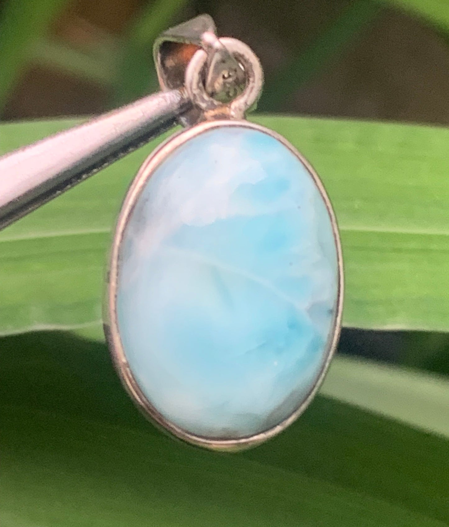 Larimar, Silver pendant, 31mm high x 15mm wide x 7mm thick. Sold with a free adjustable black cord!