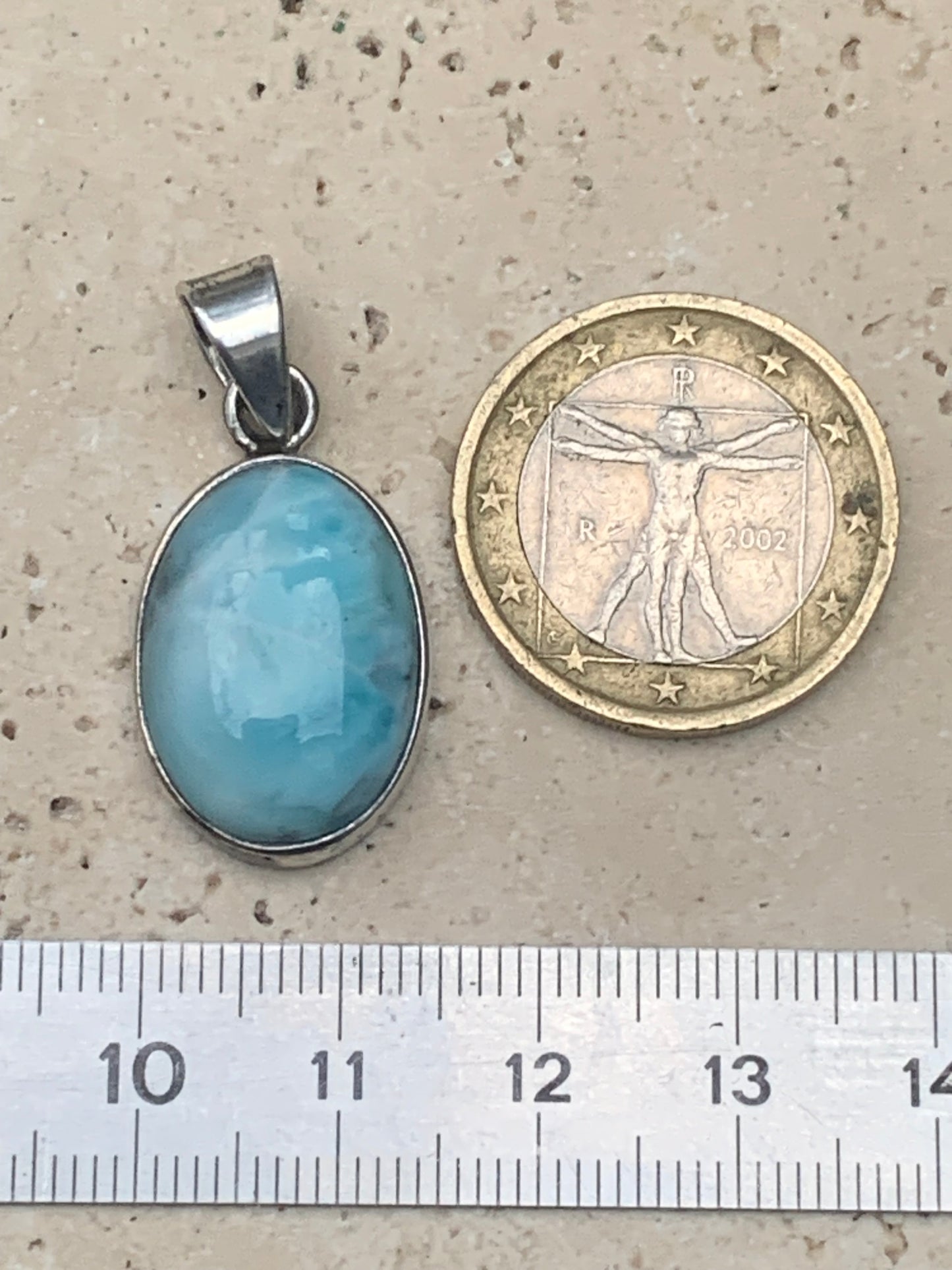 Larimar, Silver pendant, 31mm high x 15mm wide x 7mm thick. Sold with a free adjustable black cord!