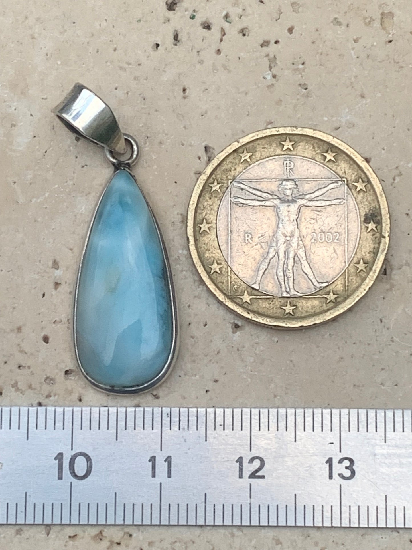 Larimar, Silver pendant, 36 mm high x 12 mm wide x 6 mm thick. Sold with a free adjustable black cord!