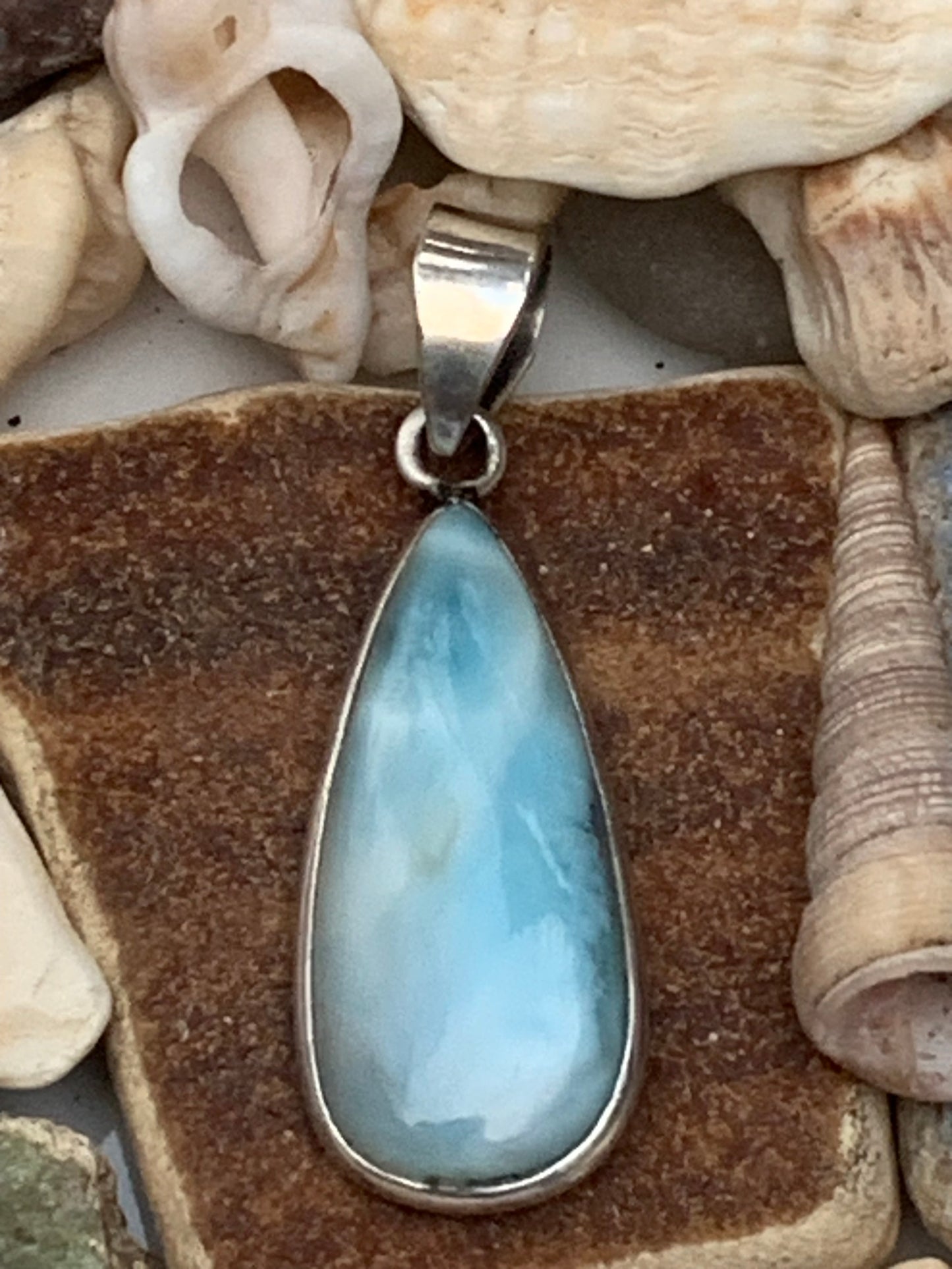 Larimar, Silver pendant, 36 mm high x 12 mm wide x 6 mm thick. Sold with a free adjustable black cord!