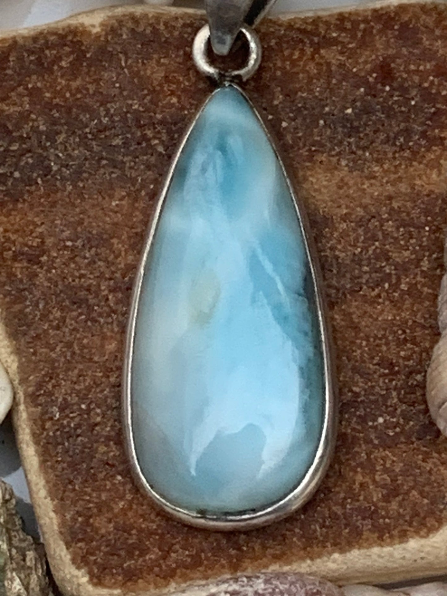 Larimar, Silver pendant, 36 mm high x 12 mm wide x 6 mm thick. Sold with a free adjustable black cord!