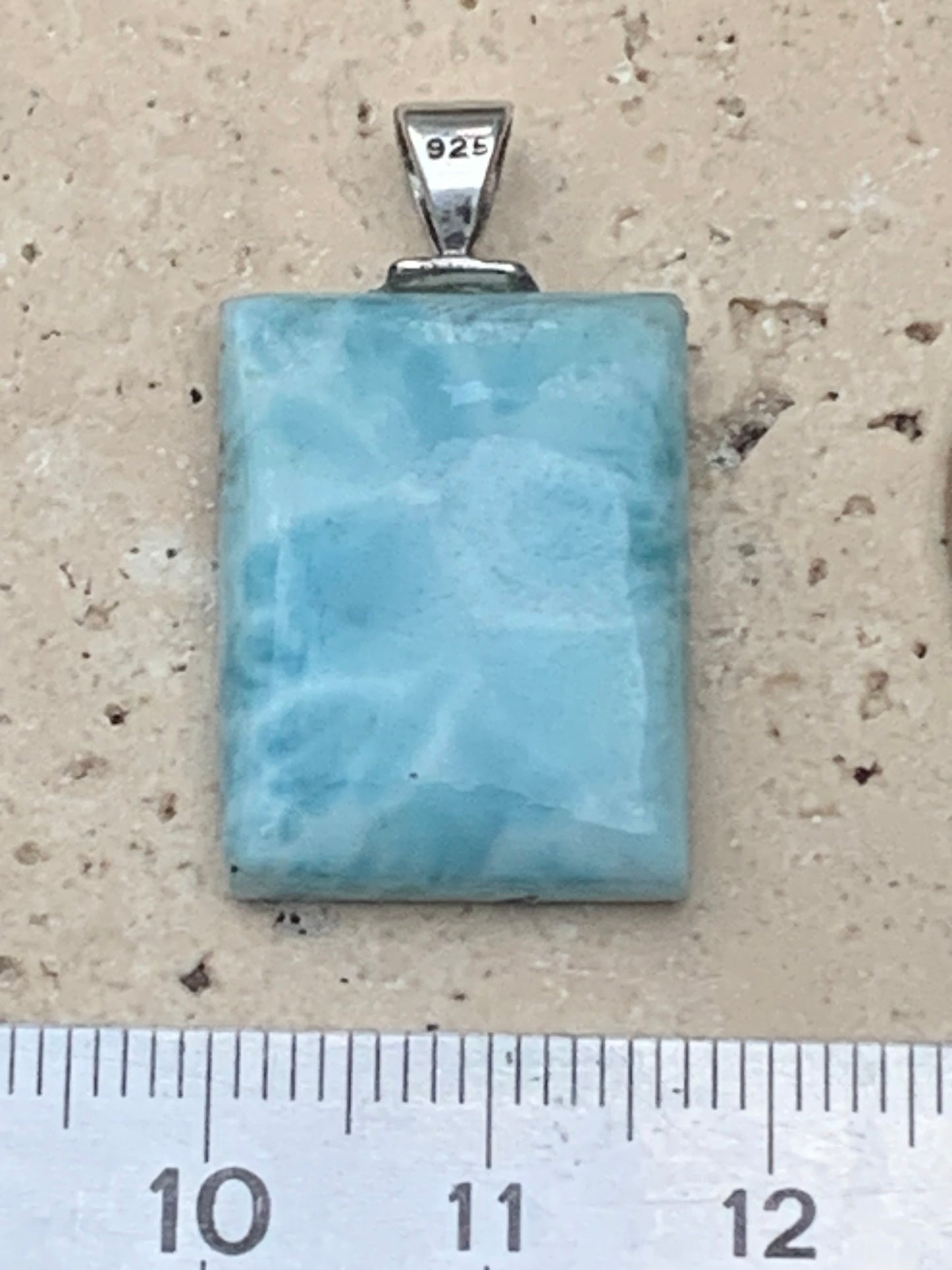 Larimar, Silver pendant, 35 mm high x 17 mm wide x 6 mm thick. Sold with a free adjustable black cord!
