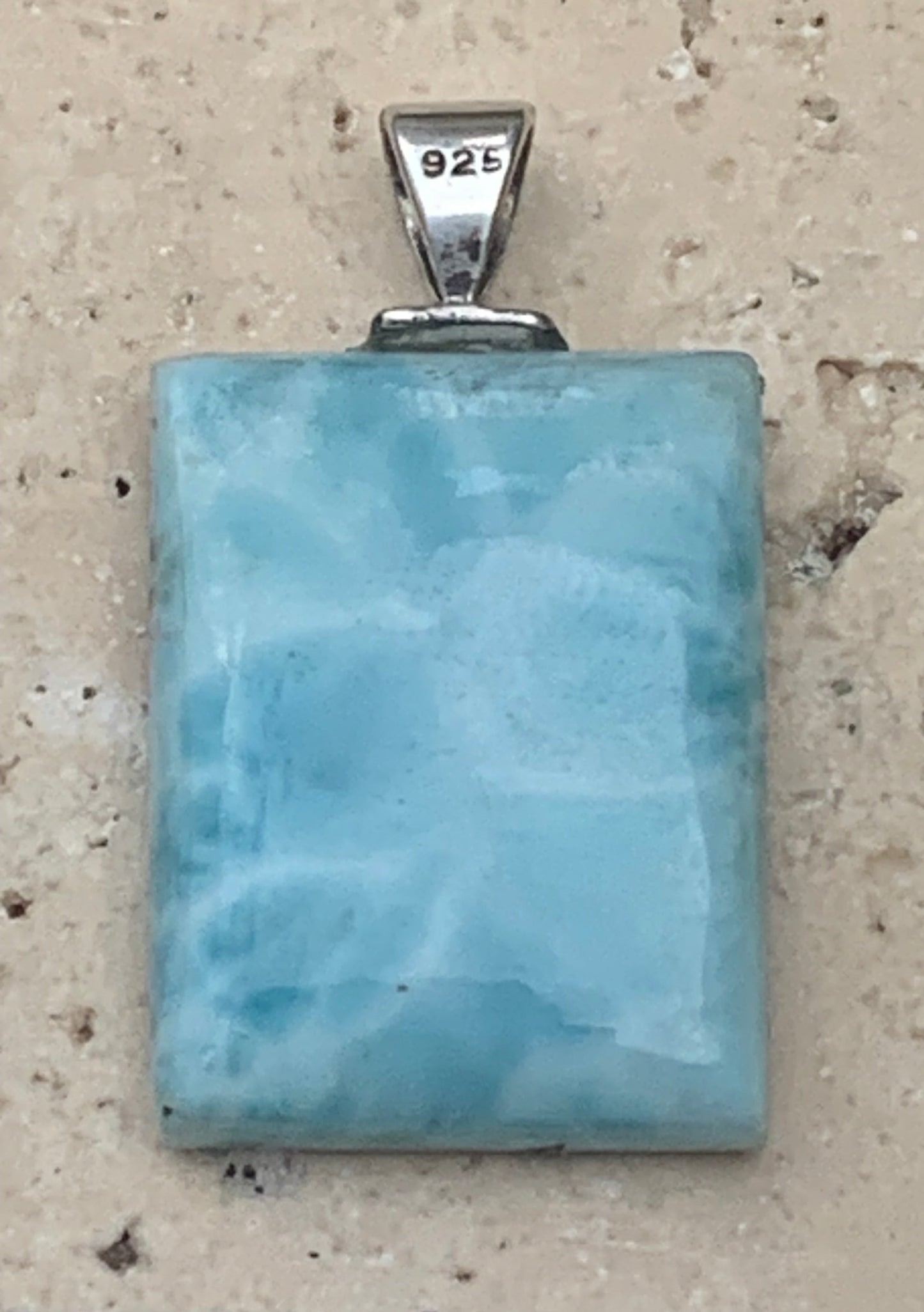 Larimar, Silver pendant, 35 mm high x 17 mm wide x 6 mm thick. Sold with a free adjustable black cord!