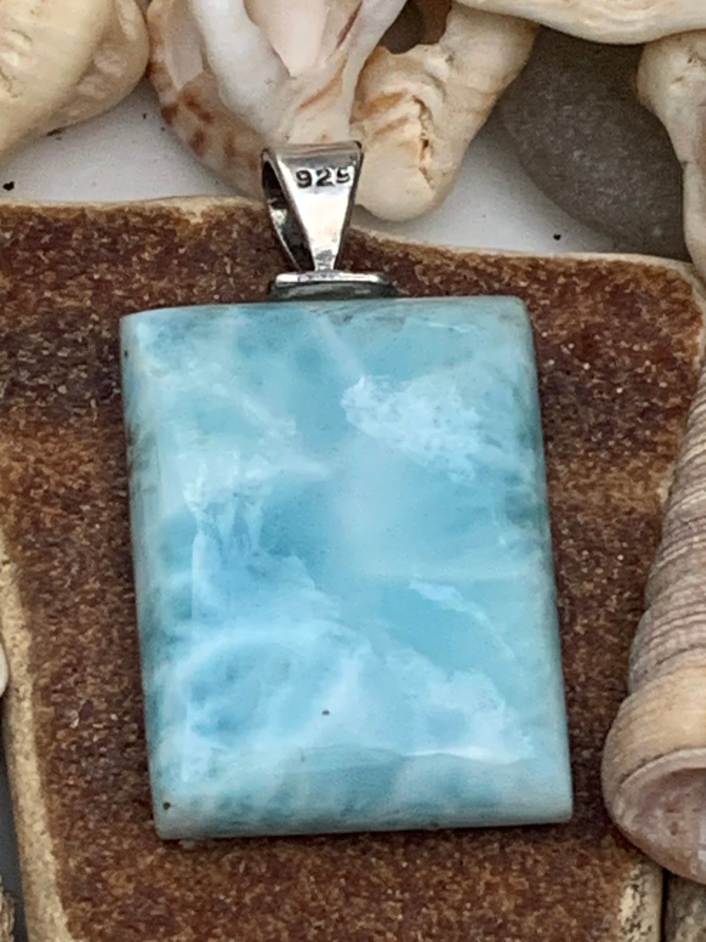 Larimar, Silver pendant, 35 mm high x 17 mm wide x 6 mm thick. Sold with a free adjustable black cord!