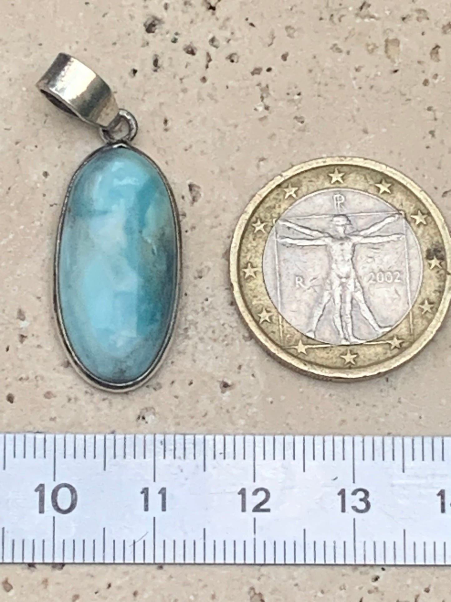 Larimar, Silver pendant, 35 mm high x 14 mm wide x 6 mm thick. Sold with a free adjustable black cord!