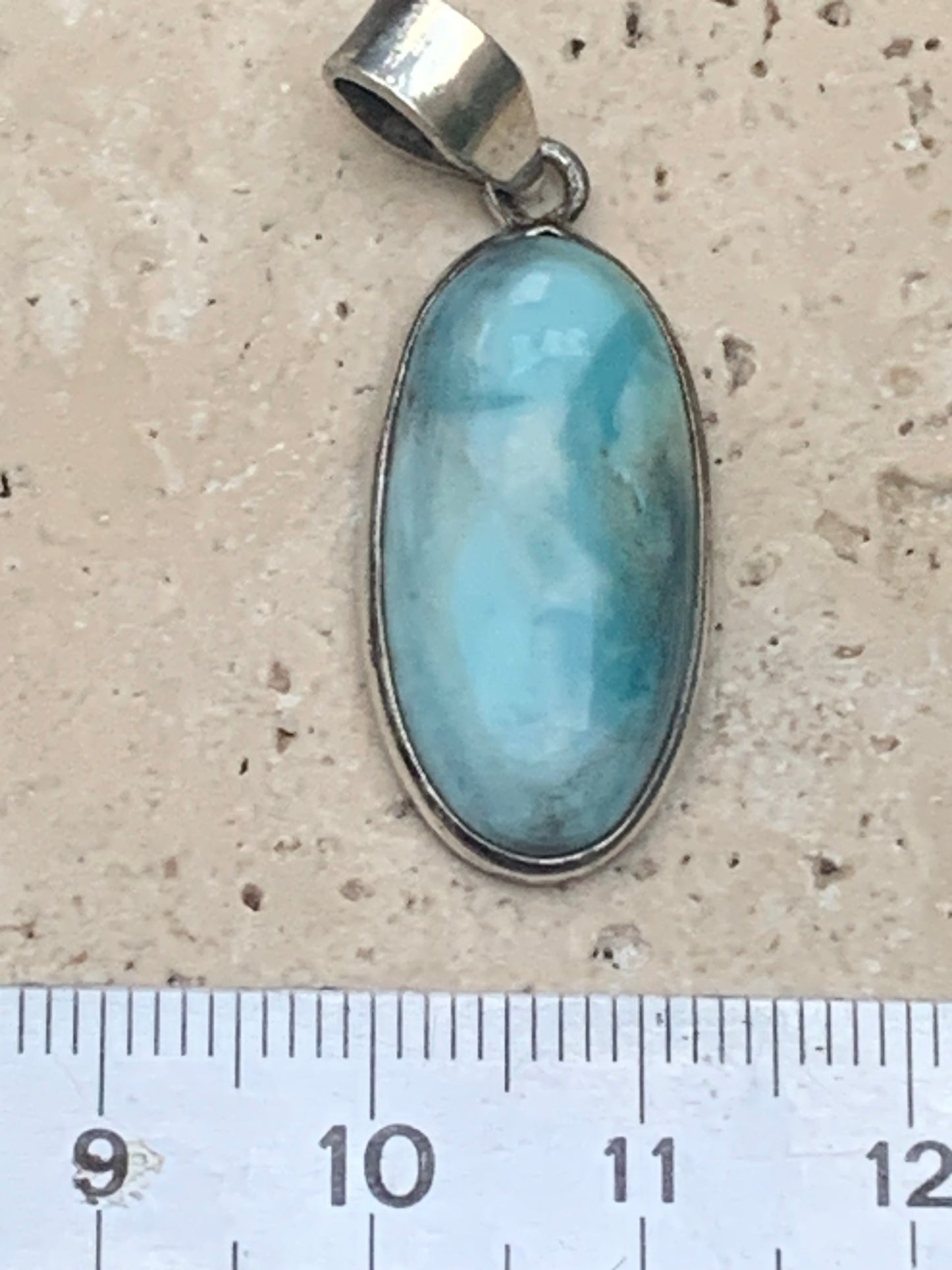 Larimar, Silver pendant, 35 mm high x 14 mm wide x 6 mm thick. Sold with a free adjustable black cord!