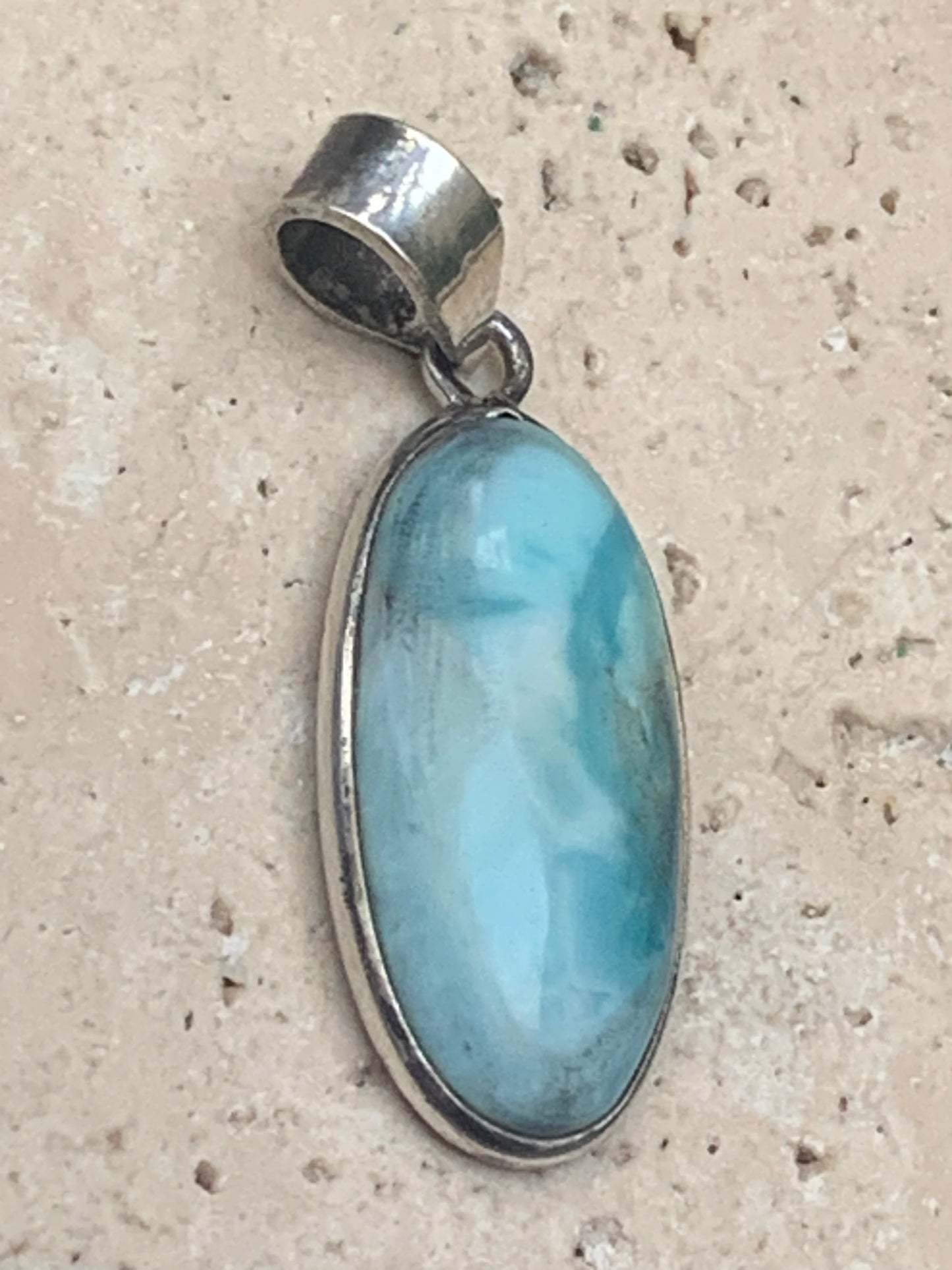 Larimar, Silver pendant, 35 mm high x 14 mm wide x 6 mm thick. Sold with a free adjustable black cord!