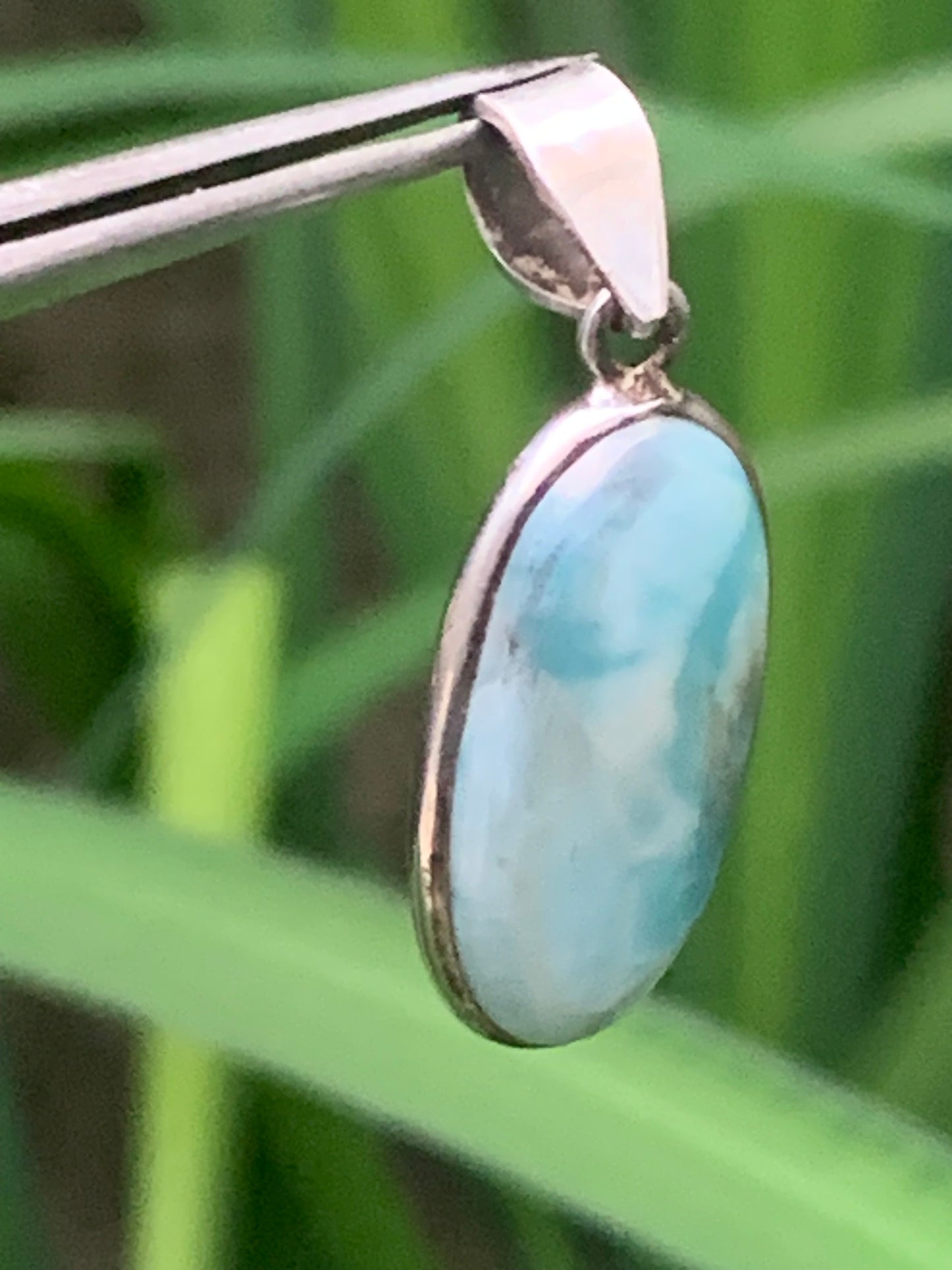 Larimar, Silver pendant, 35 mm high x 14 mm wide x 6 mm thick. Sold with a free adjustable black cord!