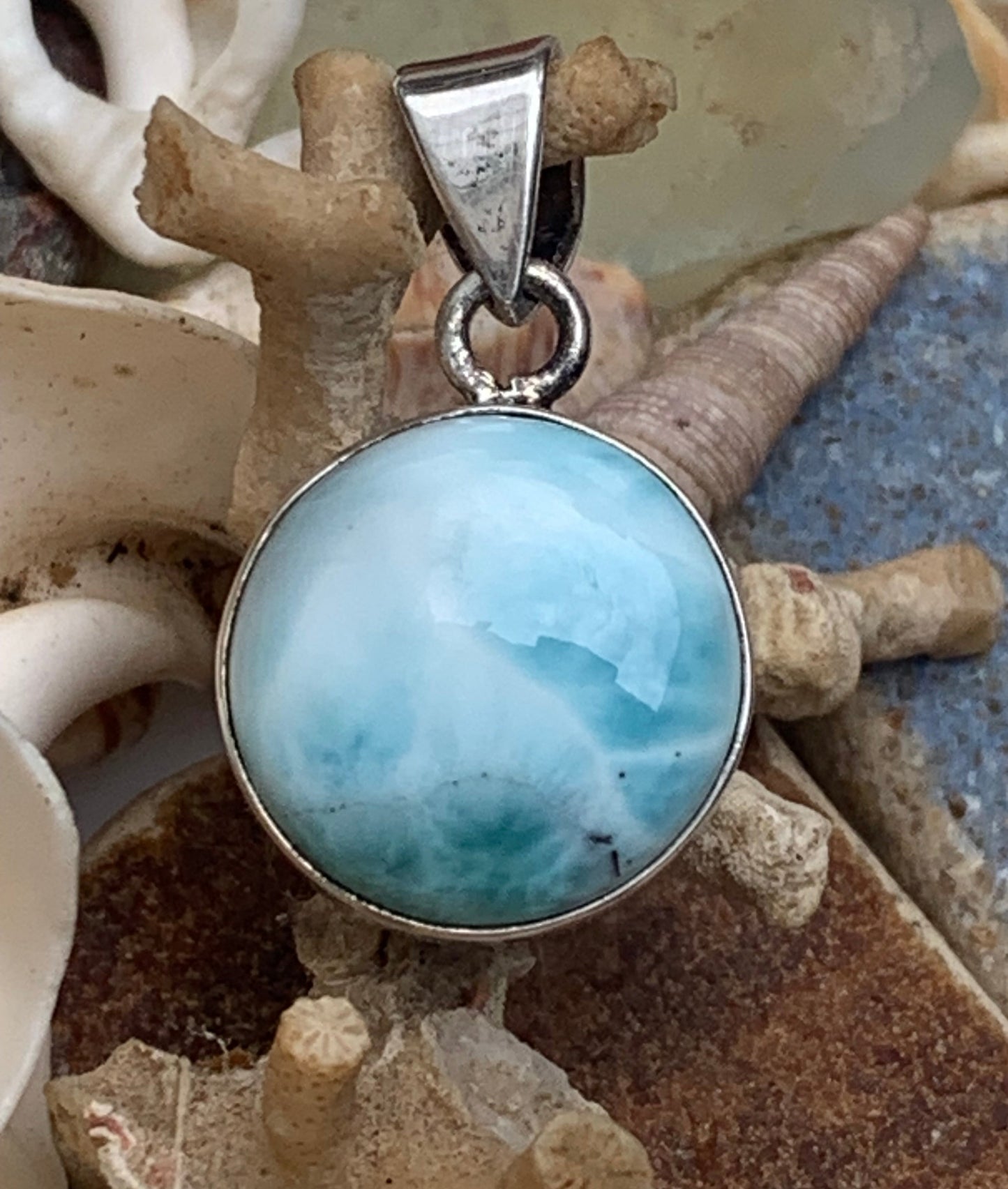 Larimar, Silver pendant, 31mm high x 17mm wide x 6mm thick. Sold with a free adjustable black cord!