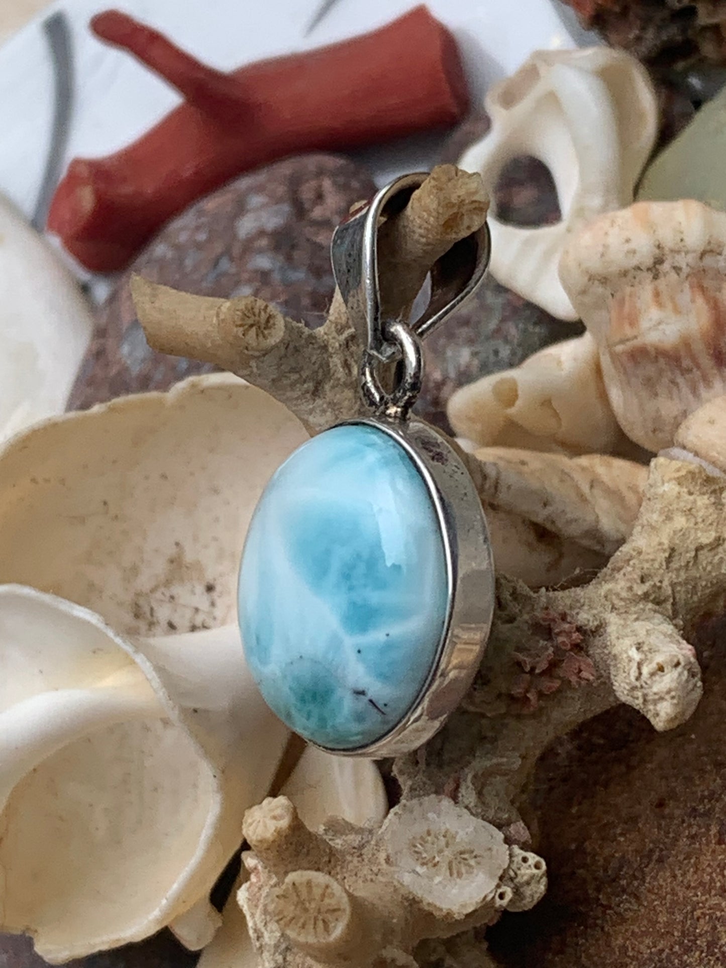Larimar, Silver pendant, 31mm high x 17mm wide x 6mm thick. Sold with a free adjustable black cord!