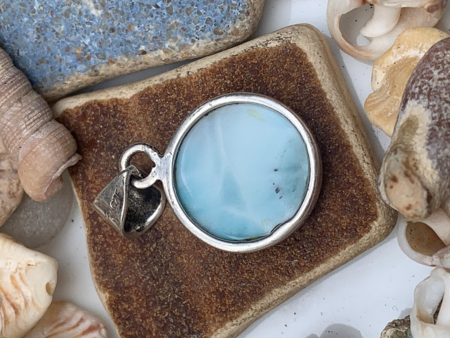 Larimar, Silver pendant, 31mm high x 17mm wide x 6mm thick. Sold with a free adjustable black cord!