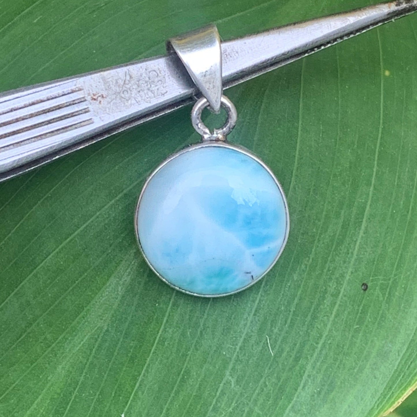 Larimar, Silver pendant, 31mm high x 17mm wide x 6mm thick. Sold with a free adjustable black cord!