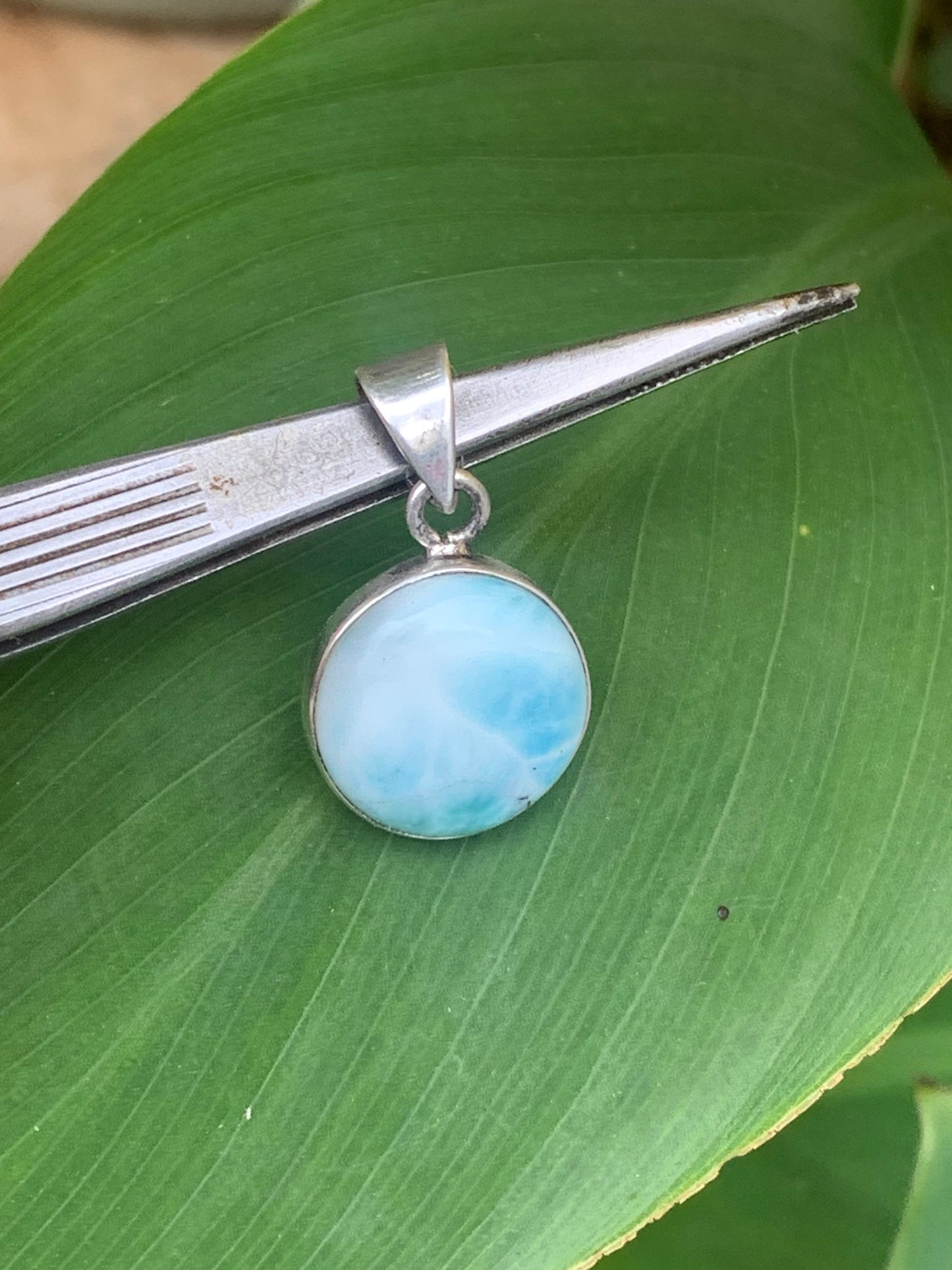 Larimar, Silver pendant, 31mm high x 17mm wide x 6mm thick. Sold with a free adjustable black cord!