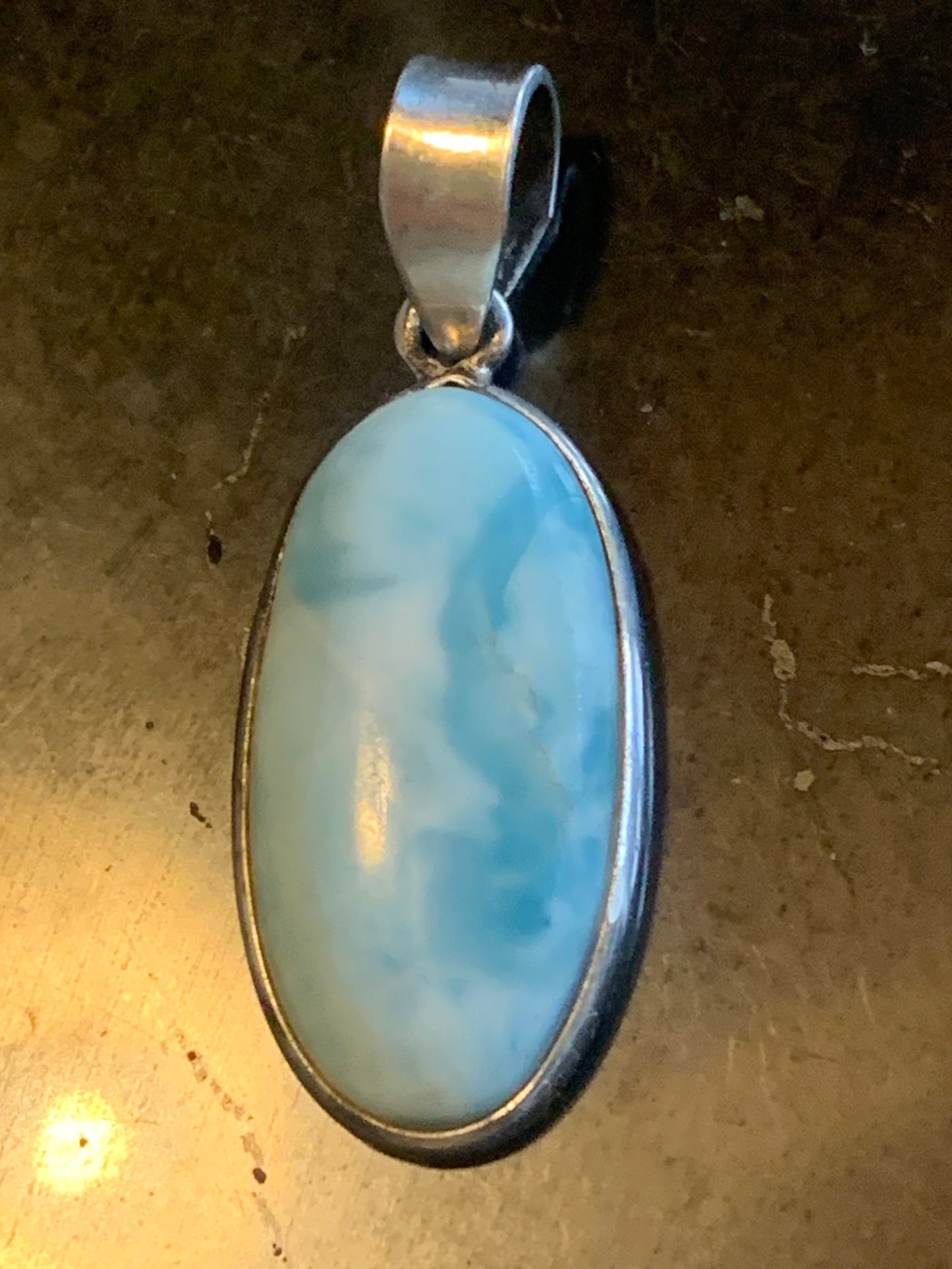 Larimar, Silver pendant, 35 mm high x 14 mm wide x 6 mm thick. Sold with a free adjustable black cord!
