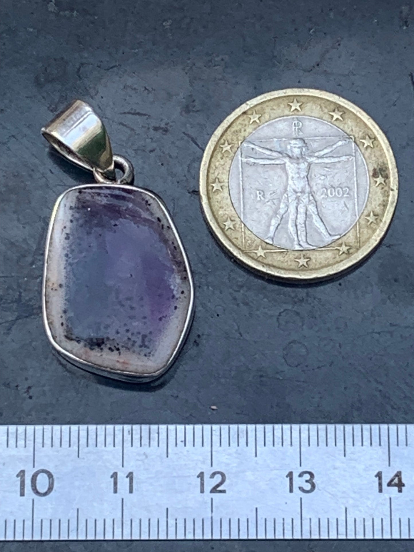 Améthyste 'super 7/ super seven', pendentif en Argent de 38mm de hauteur x 18 de largeur x 6 d'épaisseur. Vendu avec cordon réglable de couleur noire offert !