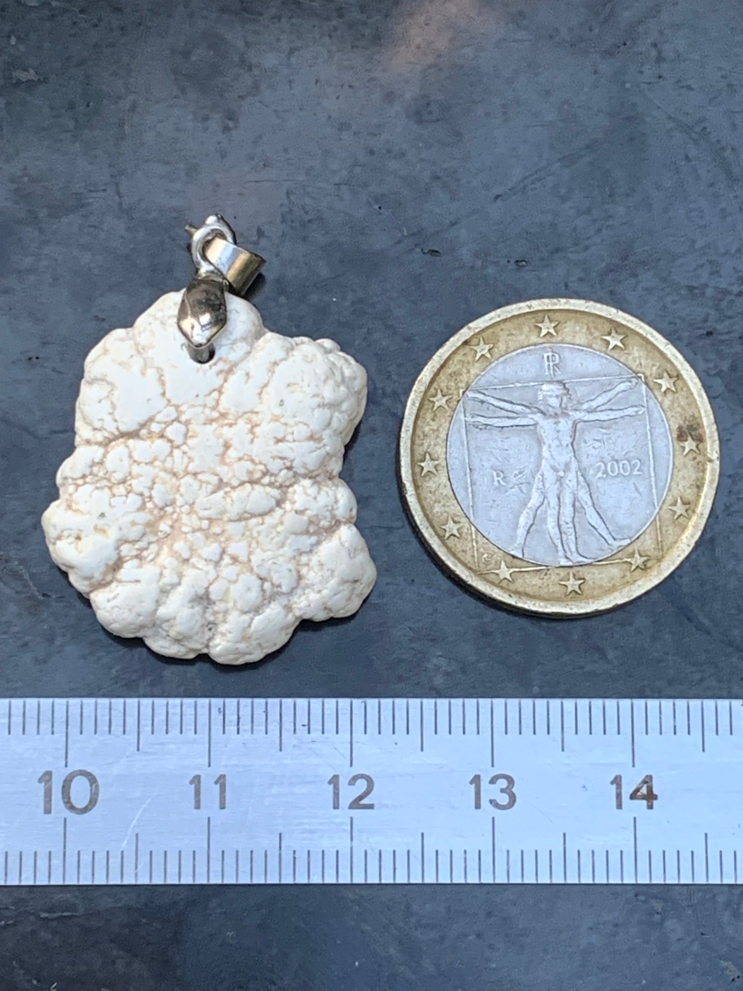 Howlite, pendant 33mm high x 24 wide x 8 thick. Sold with adjustable black cord!