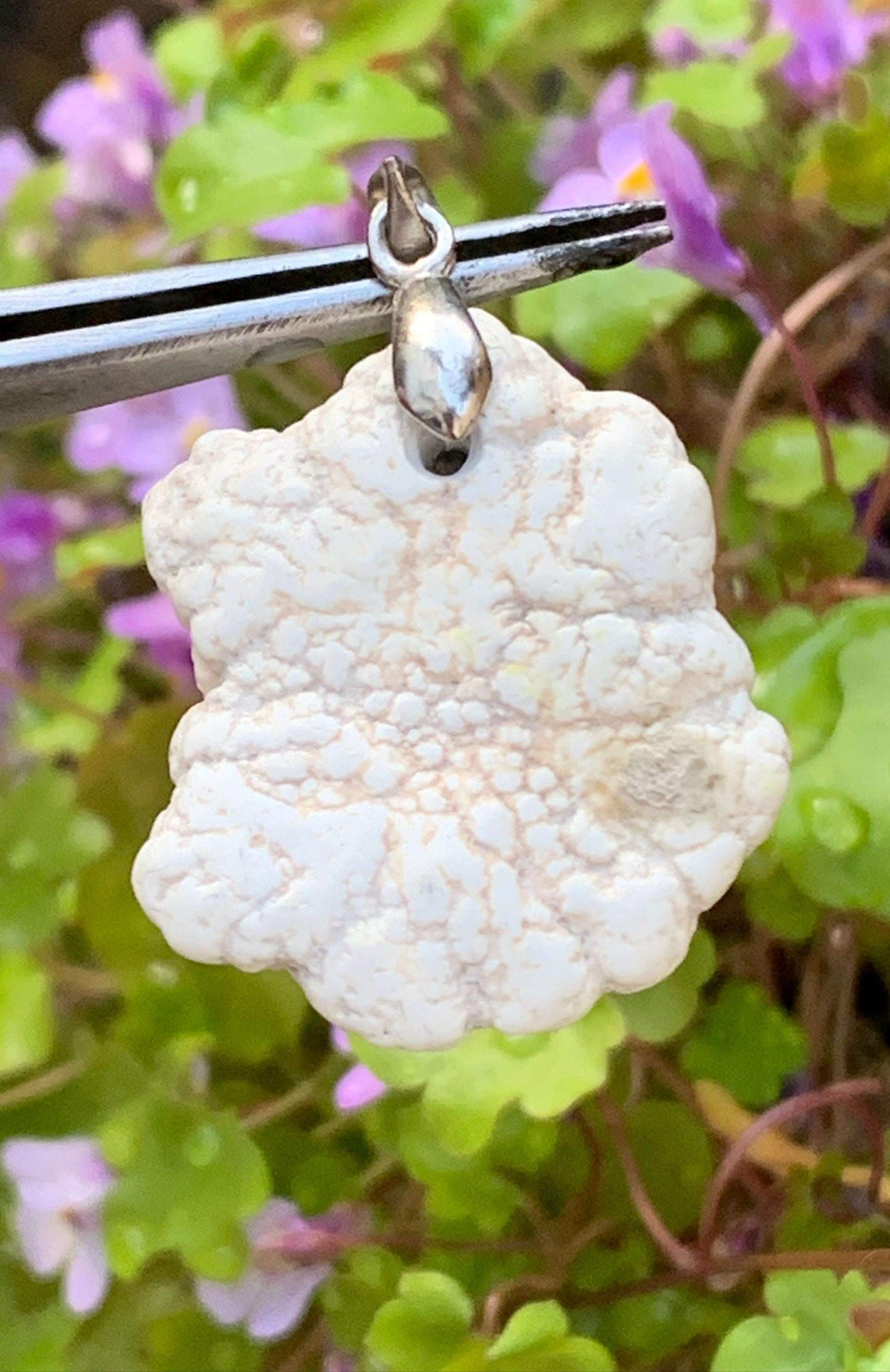 Howlite, pendant 33mm high x 24 wide x 8 thick. Sold with adjustable black cord!