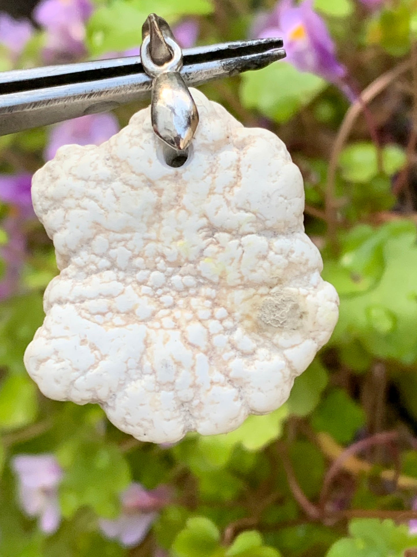 Howlite, pendant 33mm high x 24 wide x 8 thick. Sold with adjustable black cord!