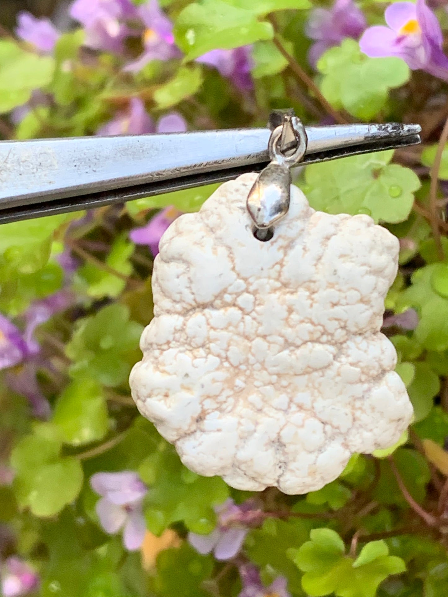 Howlite, pendant 33mm high x 24 wide x 8 thick. Sold with adjustable black cord!