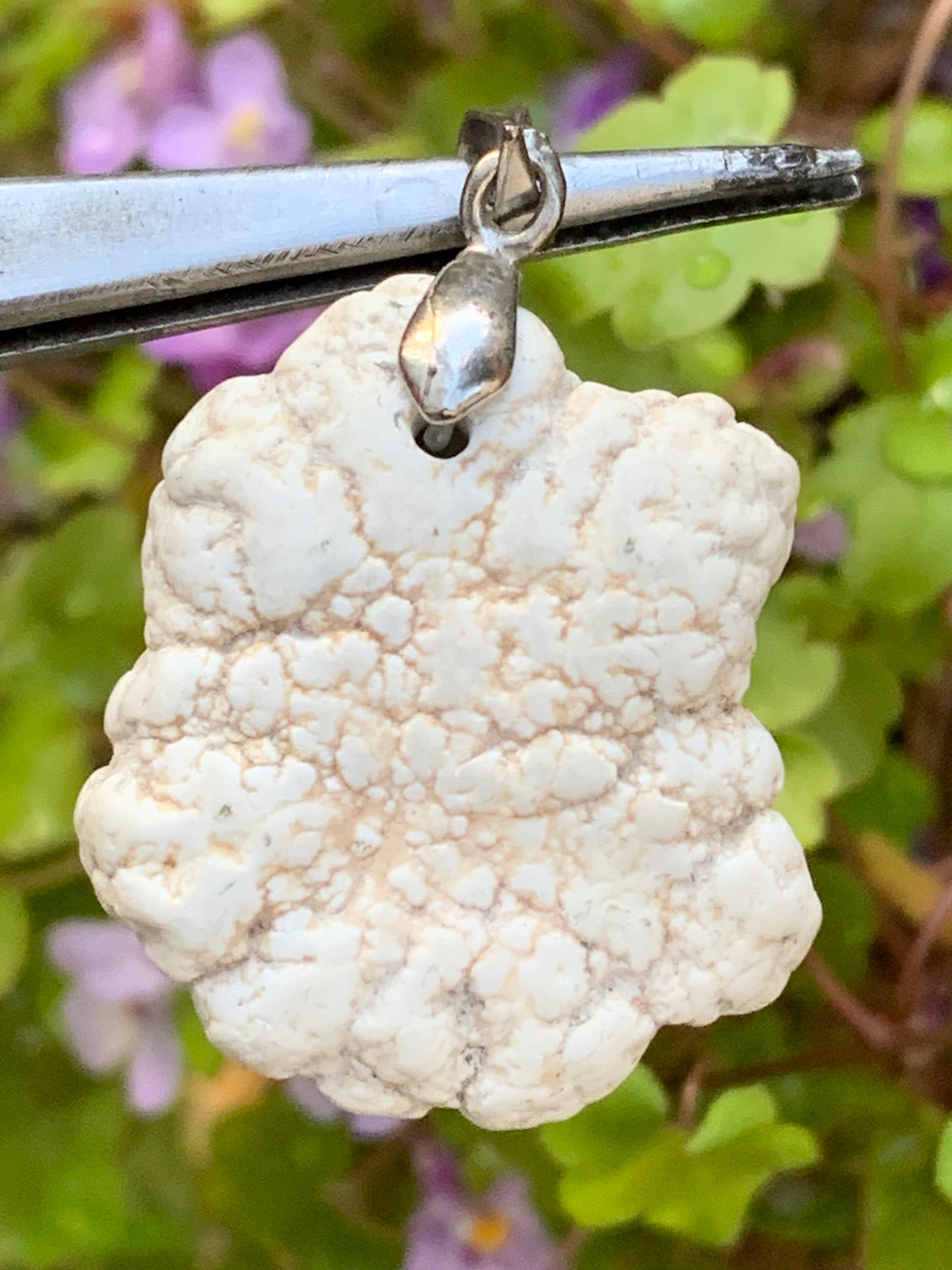 Howlite, pendant 33mm high x 24 wide x 8 thick. Sold with adjustable black cord!
