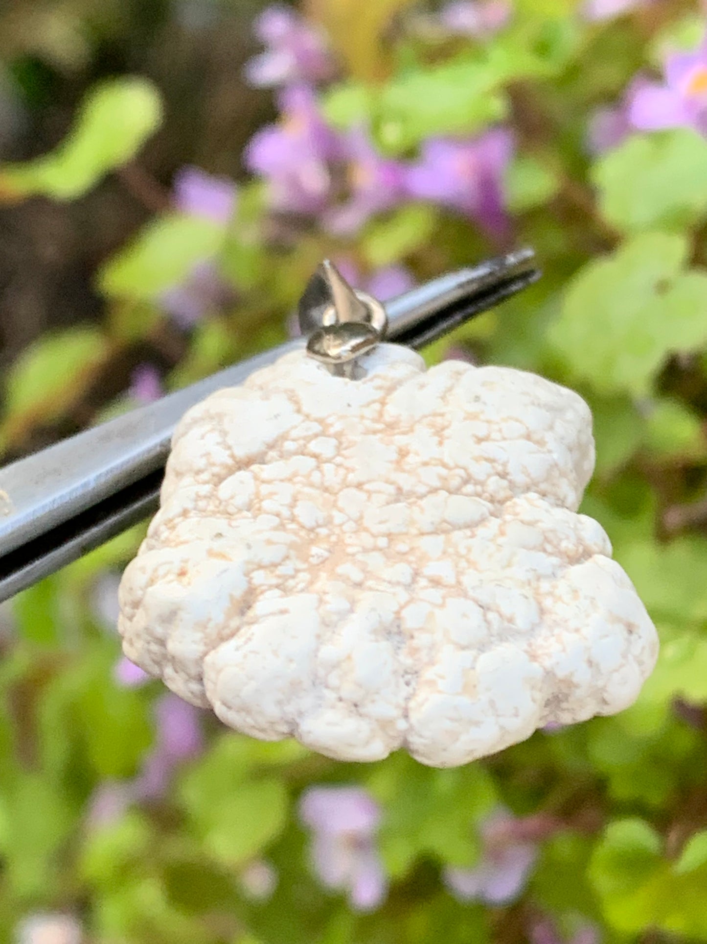 Howlite, pendant 33mm high x 24 wide x 8 thick. Sold with adjustable black cord!
