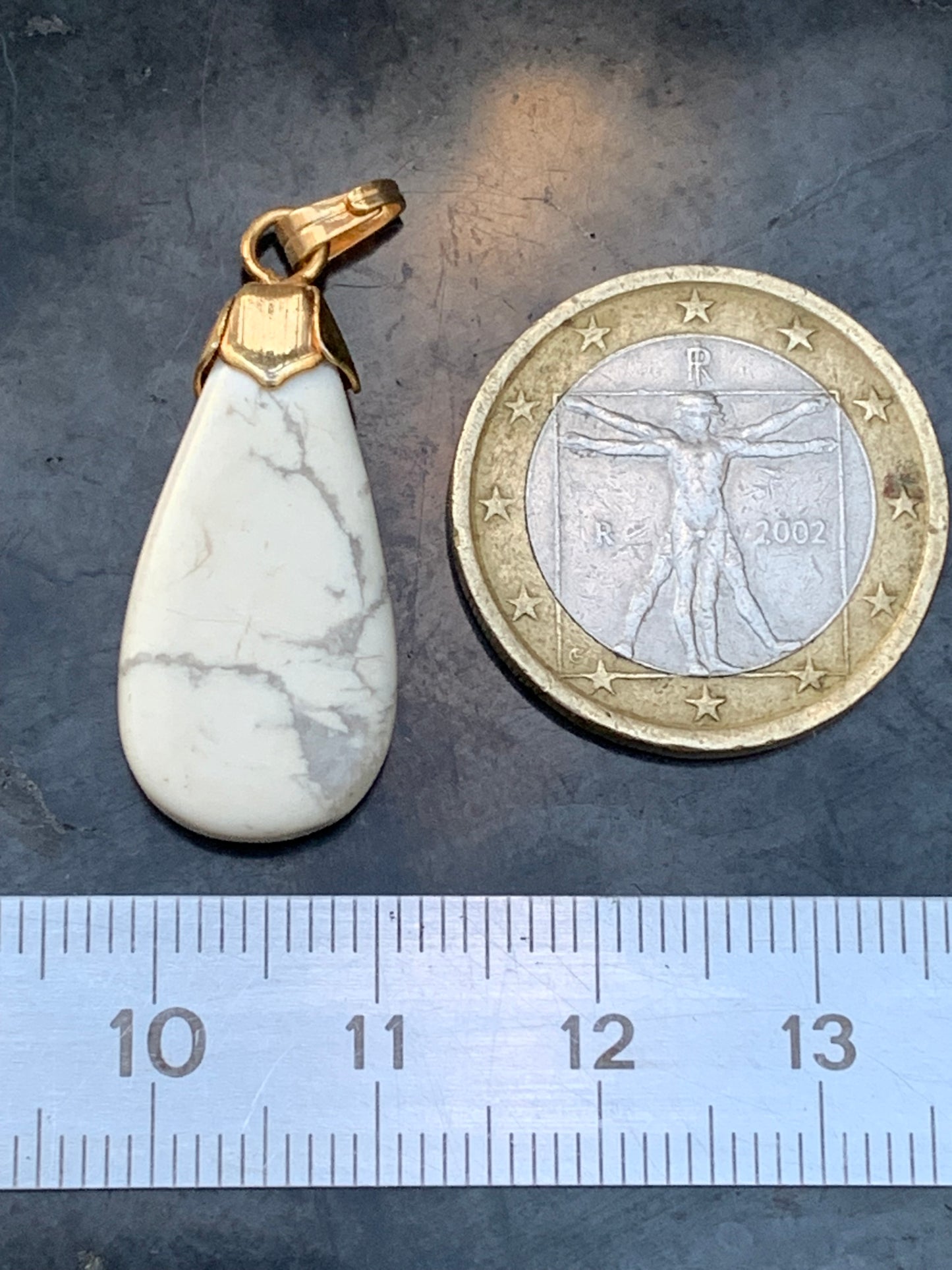 Howlite, pendant 34mm high x 13 wide x 5 thick. Sold with adjustable black cord!