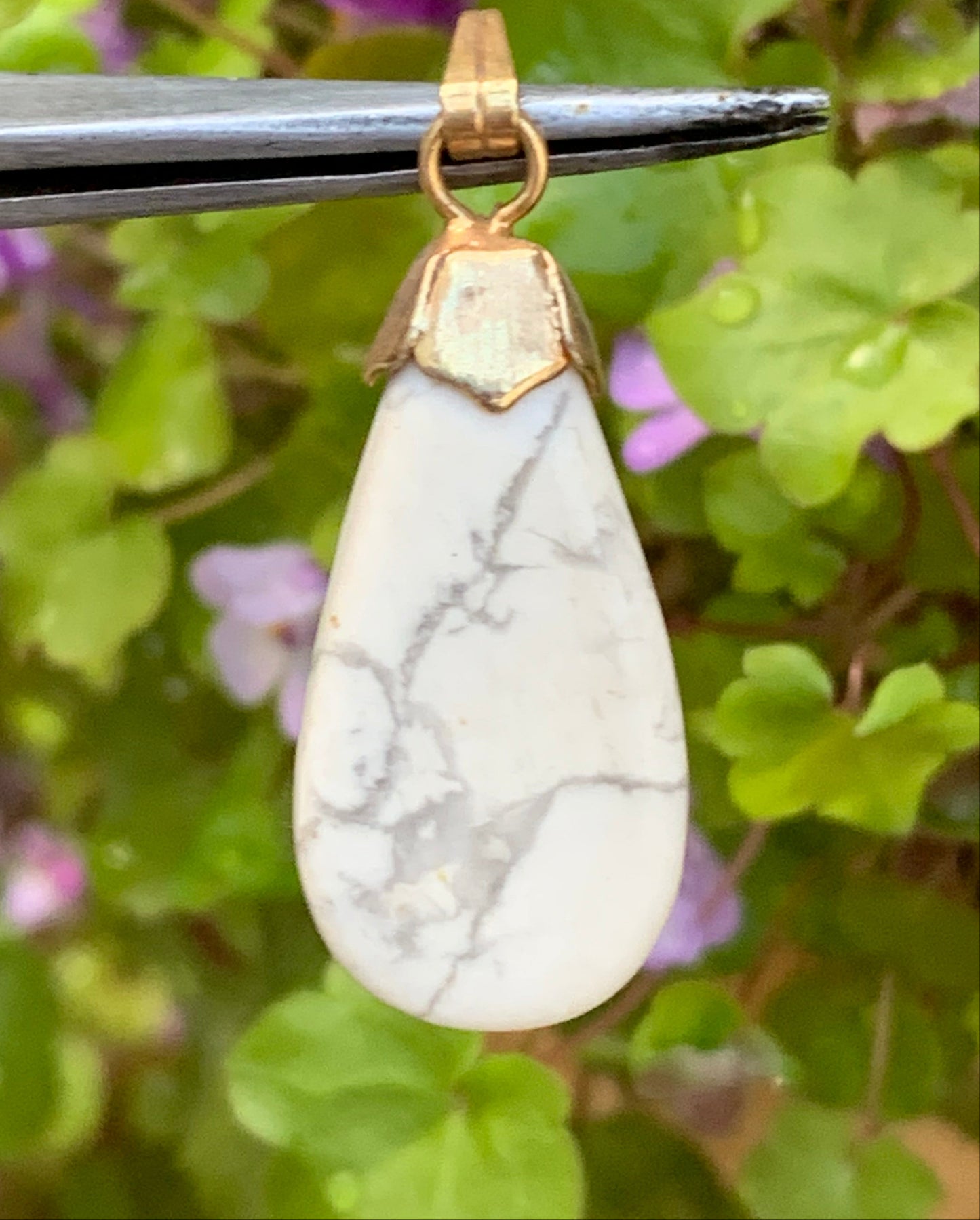 Howlite, pendant 34mm high x 13 wide x 5 thick. Sold with adjustable black cord!