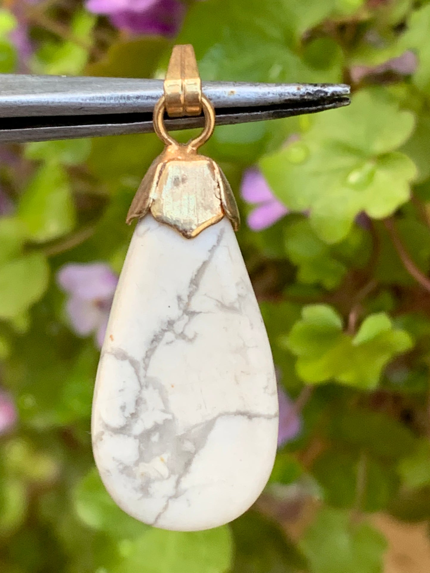Howlite, pendant 34mm high x 13 wide x 5 thick. Sold with adjustable black cord!